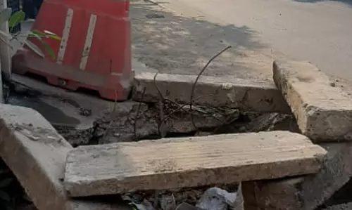 திறந்த நிலையில் மழைநீர் வடிகால்வாய்