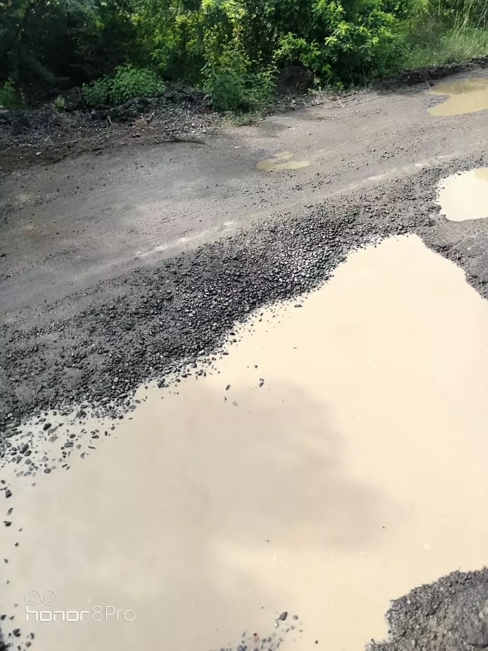 சேதமான சாலை சேதமான சாலை