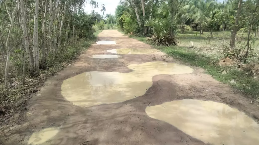 குட்டைபோல் மாறிய சாலை குட்டைபோல் மாறிய சாலை