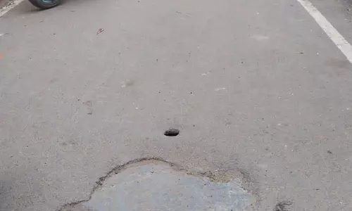 தார் சாலை சேதம் தார் சாலை சேதம்