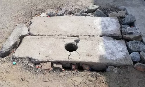 உடைந்த தொட்டி மூடி உடைந்த தொட்டி மூடி