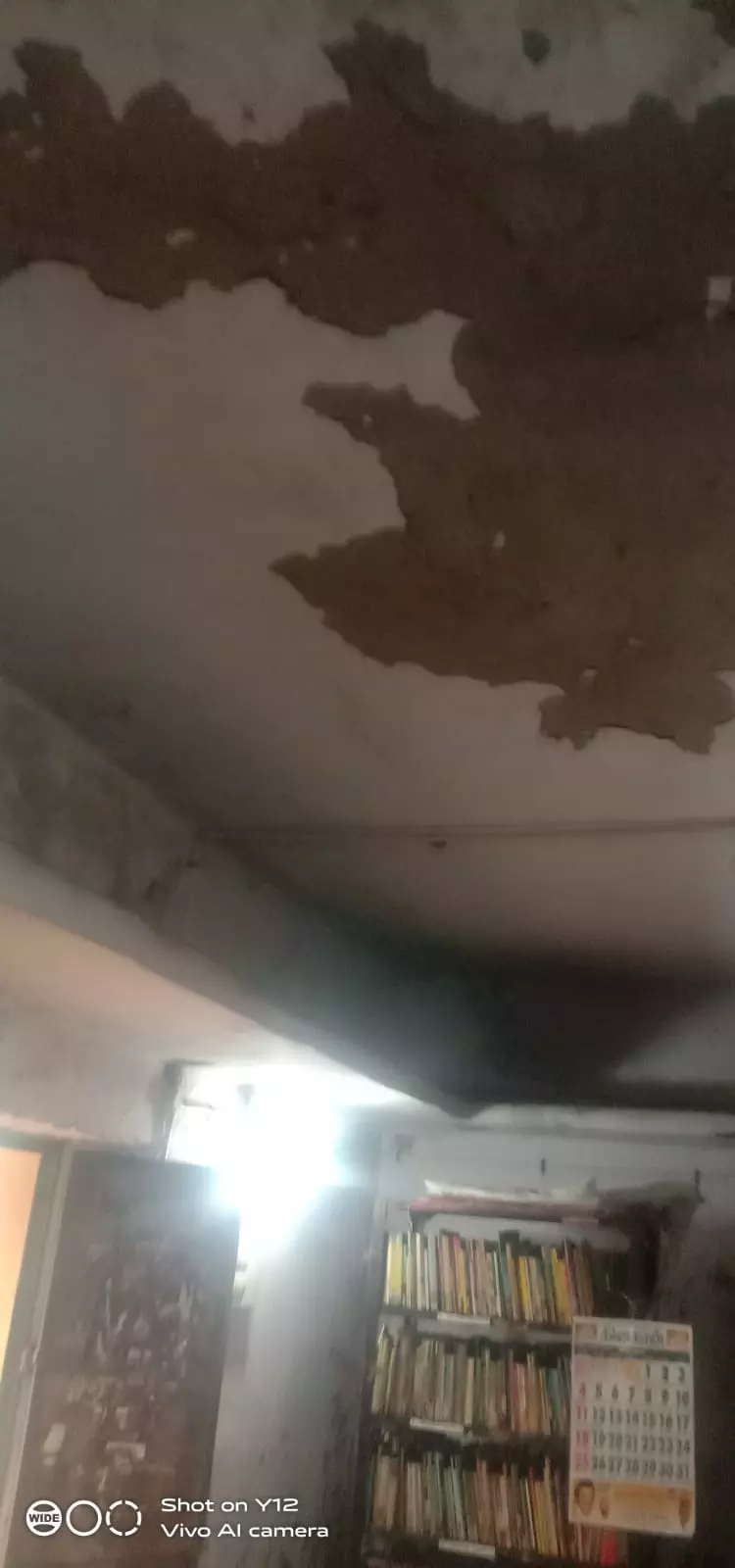 சேதமடைந்த நூலக கட்டிடம் சேதமடைந்த நூலக கட்டிடம்