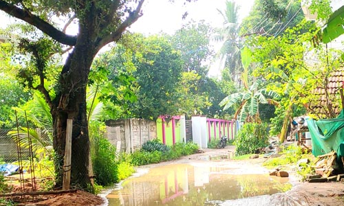 குளமாக மாறிய சாலை குளமாக மாறிய சாலை
