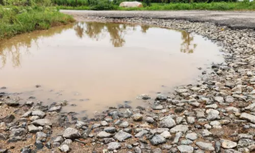 சாலை சேதம் சாலை சேதம்