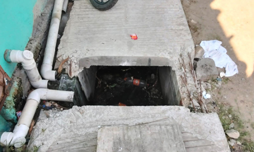 மழைநீர் கால்வாய்க்கு மூடி போட வேண்டும்