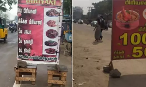 சாலையோர பெயர் பலகையால் இடையூறு