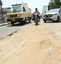 குண்டும்-குழியுமான சாலை